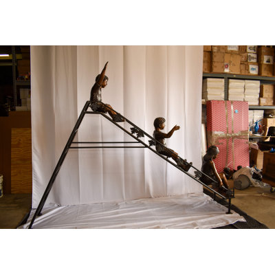 Nifao Collection Lifsize Three kids playing on a slide bronze sculpture 114" x 18" x 83"H