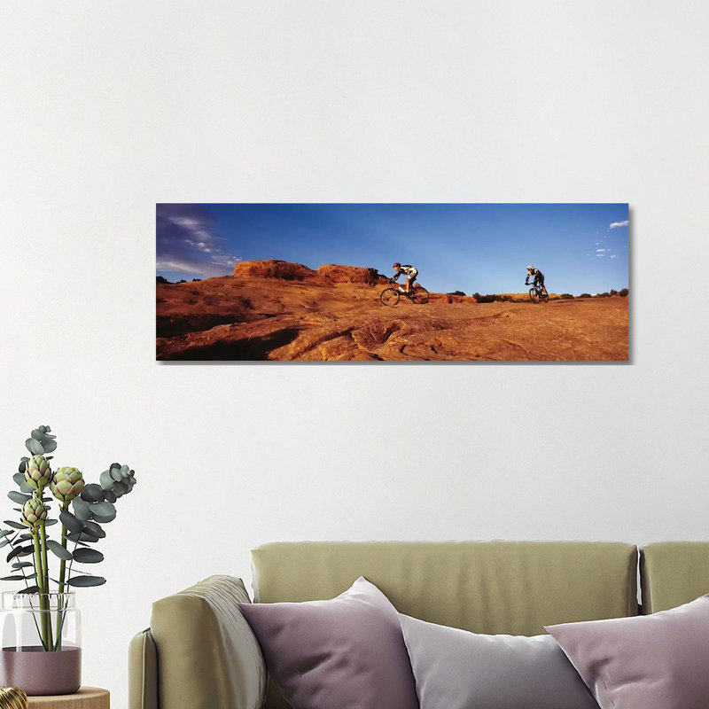 Two People Mountain Biking, Moab, Utah, USA by Panoramic Images - Wrapped Canvas Panoramic Print