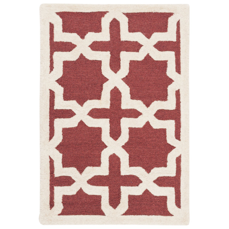 Tapis rouille en laine touffeté à la main à motif géométrique