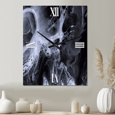 Horloge murale abstraite en marbre noir et blanc
