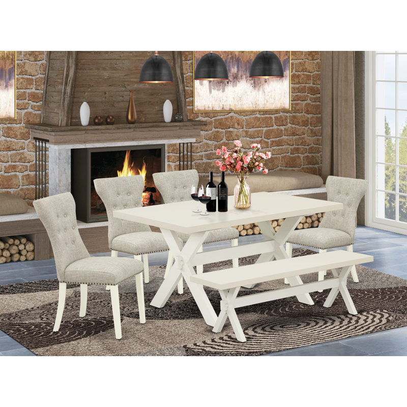 L'ensemble de table de salle à manger 6 pièces contient une table de cuisine rectangulaire avec des pieds en X et 4 chaises Parson en tissu de lin avec un banc, blanc lin