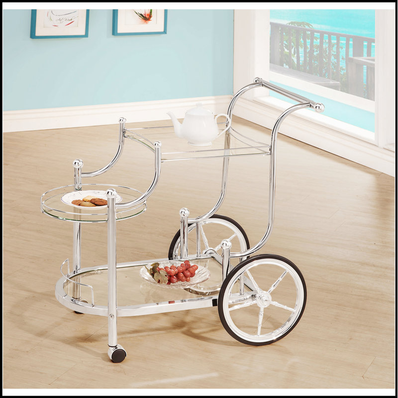 Chariot de service à 3 niveaux Reia avec roulettes, finition chromée élégante et tablettes en verre trempé durables pour les espaces modernes