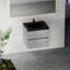 Meuble-lavabo suspendu de 61 cm (24 po), lavabo en quartz noir sable, armoire gris ciment, tiroirs à fermeture amortie, esthétique moderne, gain de place, installation facile, construction robuste, rangement de l'eau, finition élégante.