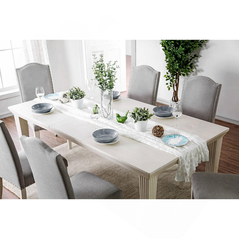 Élégante table de salle à manger rectangulaire avec rallonge extensible au fini blanc antique