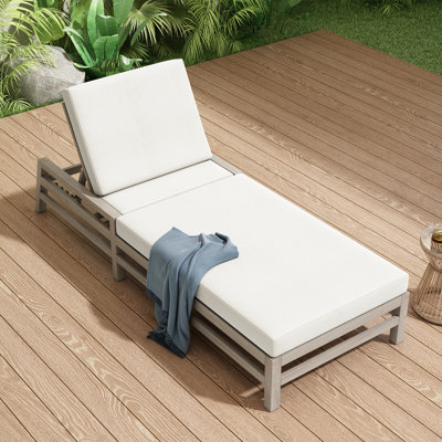 Chaise longue d'extérieur réglable avec coussins épais