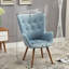 Fauteuil d'appoint à dossier capitonné en velours