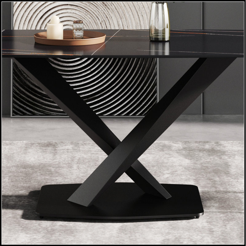 Table de salle à manger moderne en pierre artificielle noire avec pieds courbés en métal pour six personnes, durable et élégante
