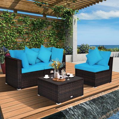 Patio 4 Piece Rattan Sectional Seating Group with Cushions by Latitude Run