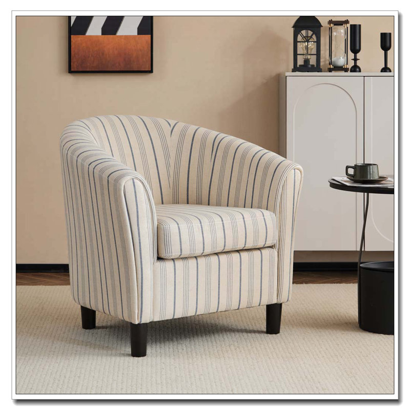 Fauteuil demi-tonneau rembourré avec accoudoirs évasés