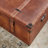 Cantrell Wood Nesting Upholstered Decorative Brown Trunk with Vintage Accents and Studs Set