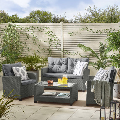 Ariona 4 Seater Rattan Garden Sofa Set & Coffee Table - Boho Design with Cushions (Cover Included)
