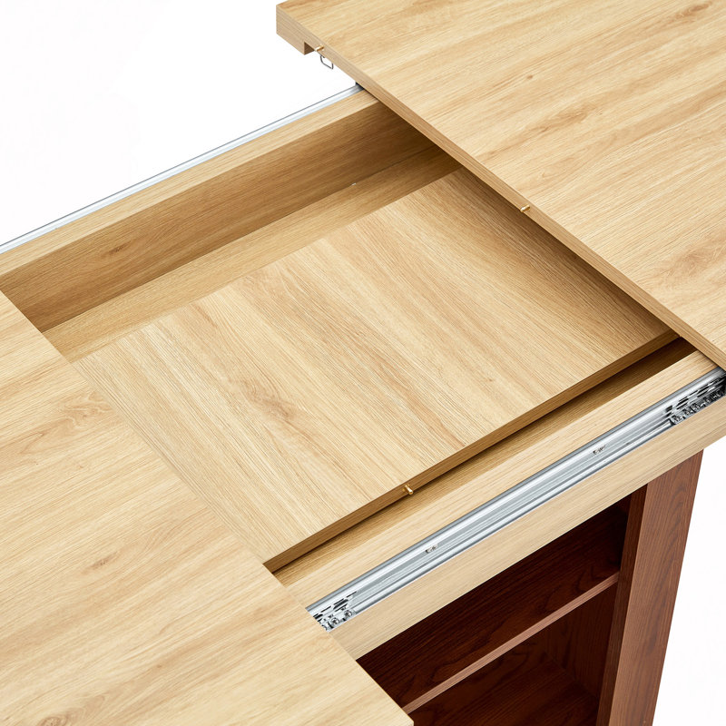 Table de salle à manger extensible avec mécanisme télescopique, idéale pour accueillir de 4 à 8 personnes dans des espaces modernes.