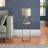 26"H Gold Metal C-Table with Abstract Marble Top: A Glamorous and Unique Accent Table for Your Living Room or Bedroom