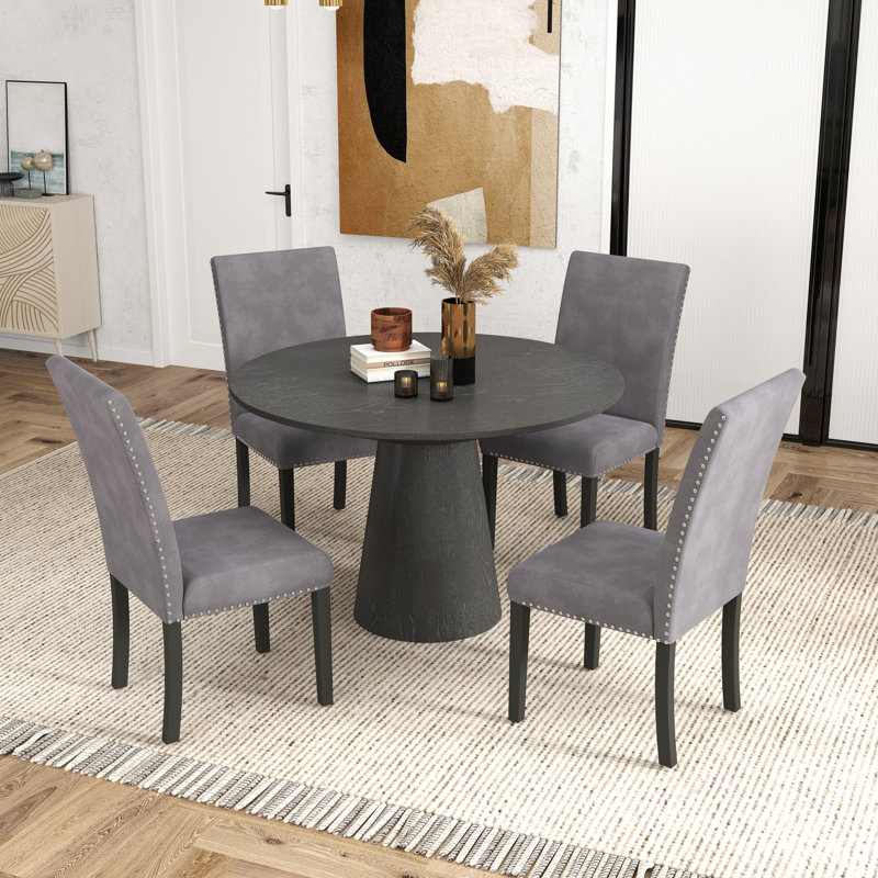 Ensemble de salle à manger rond à piédestal avec 4 chaises en velours Gresia Romero, Gris / Noir