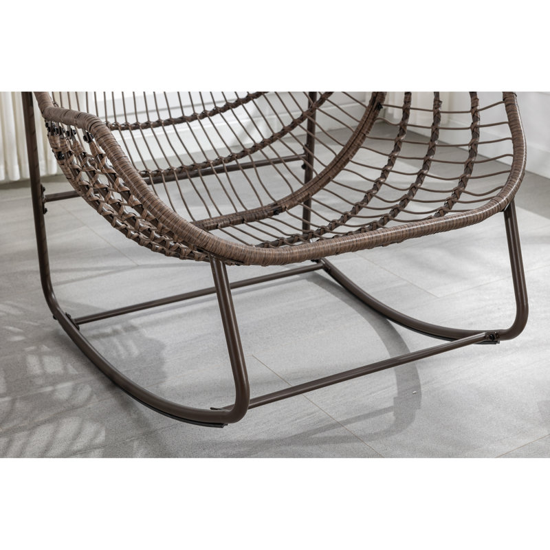 Fauteuil à bascule avec coussin bleu marine, structure en acier et siège rembourré pour une utilisation à l'extérieur -