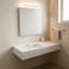 Lavabo de salle de bain en résine de pierre blanche mat de 47 pouces avec design ergonomique