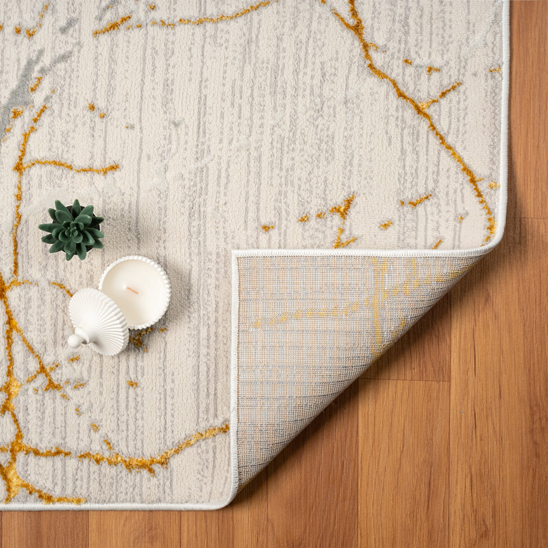 Modern Gray and Gold Abstract 4' x 6' Synthetic Area Rug