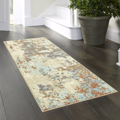 Tapis touffeté ivoire / brun