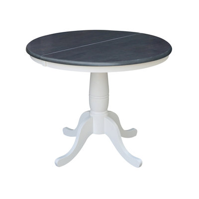 Ingbert Extendable Solid Wood Pedestal Dining Table