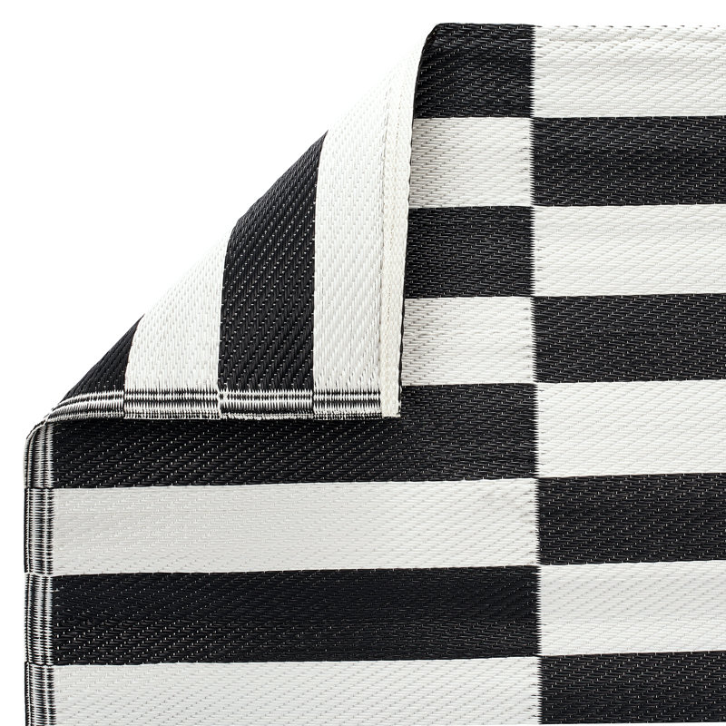 Black and White Reversible Synthetic 6' x 9' Outdoor Rug