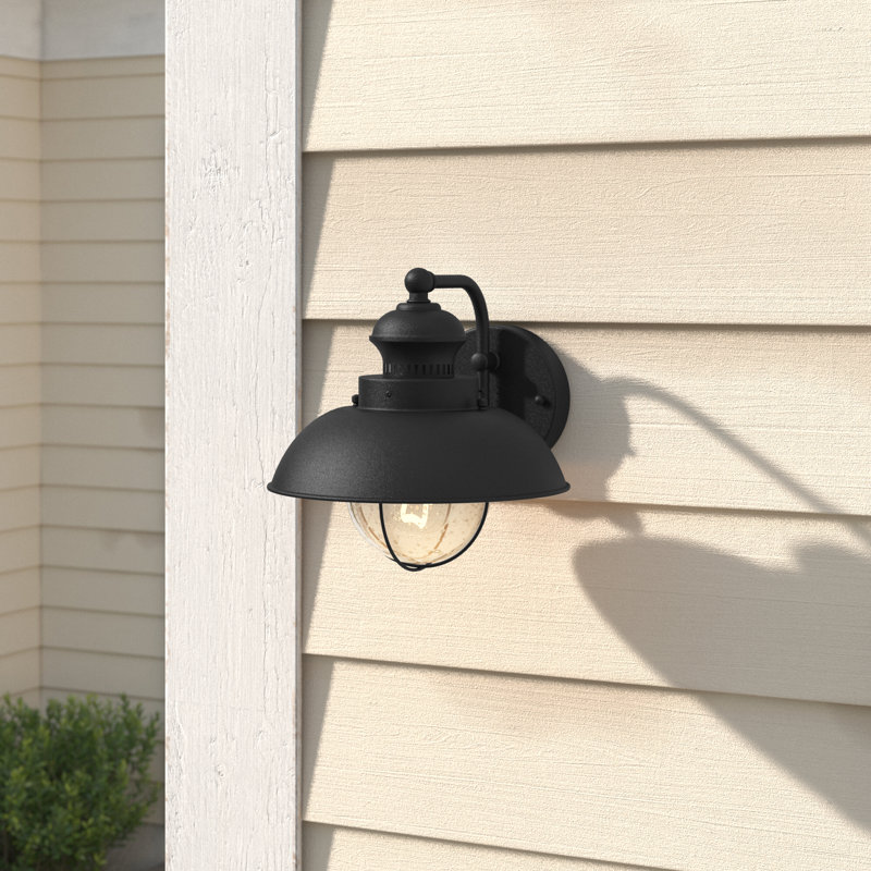 Mohnton 10.25 in. H 1-Light Textured Black Coastal Outdoor Wall Sconce made of Durable Steel, Clear Seeded Glass Shade, LED Compatible, Use for Exterior Porch Patio Front Door or Garage