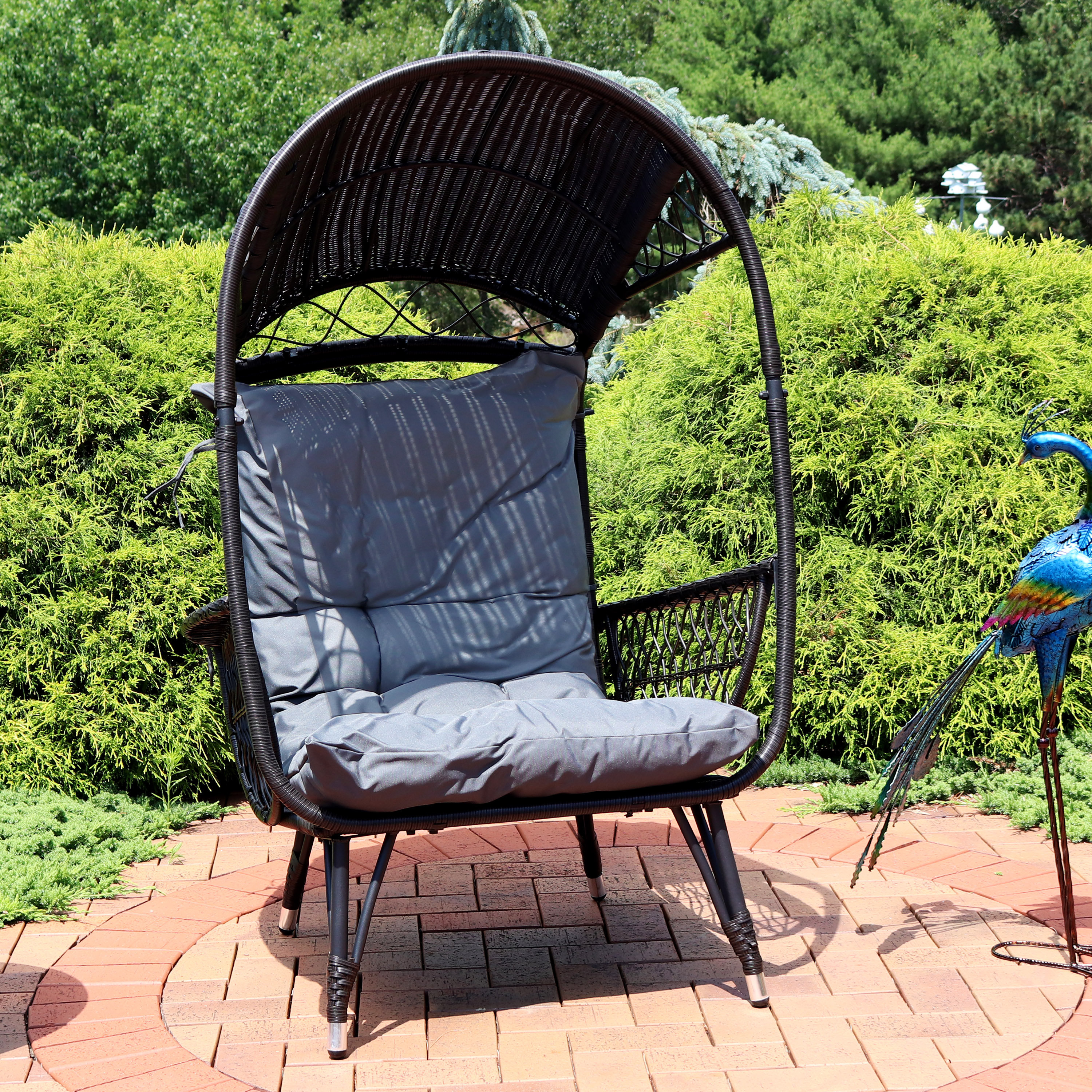 https://assets.wfcdn.com/im/90045743/compr-r85/2143/214366074/adalize-shaded-comfort-basket-patio-chair-with-cushions.jpg