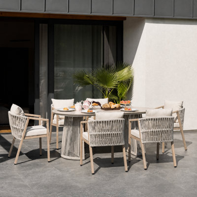 6 - Person Oval Patio Dining Set with Cushions included