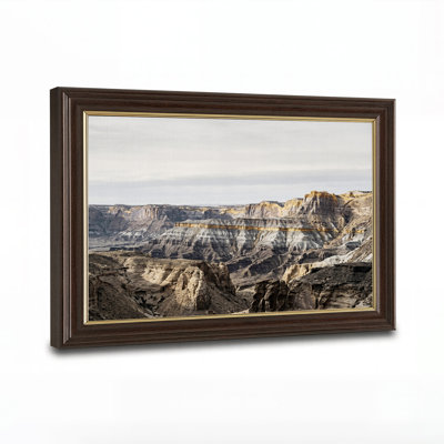Tableau sur toile représentant un paysage de canyon stratifié avec des formations rocheuses striées