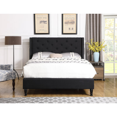 Upholstered Wingback Bed