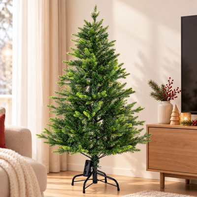 Sapin de Noël artificiel miniature en pin à pointes arrondies préilluminées de 122 cm (48 po), idéal pour une décoration personnalisée, avec un pied en métal robuste. Cet arbre de table s'intègre parfaitement à tous les décors et intérieurs champêtres.