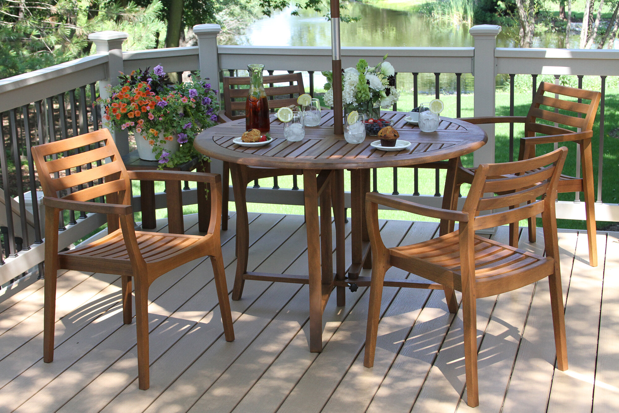 Outdoor Interiors 4 - Person Round Outdoor Dining Set & Reviews | Wayfair