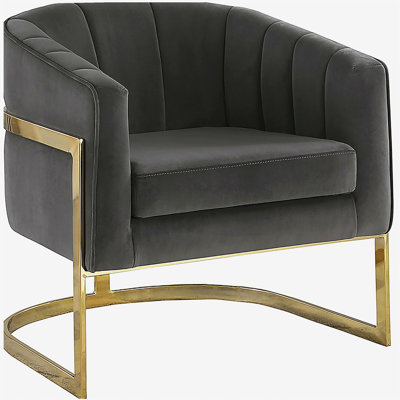 Fauteuil demi-tonneau capitonné gris foncé et doré