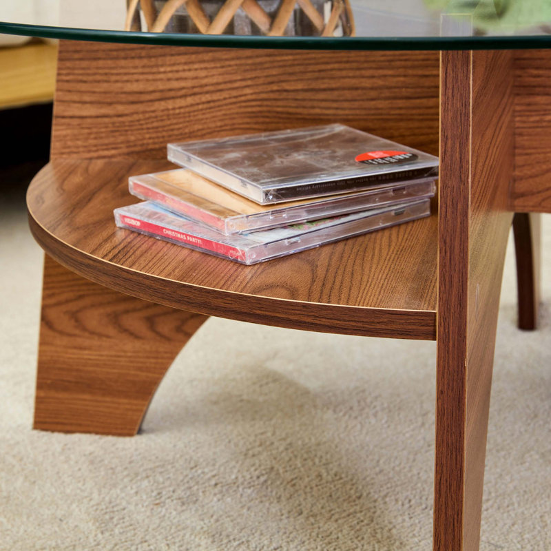 Table basse ronde en verre trempé avec pied en forme d'éventail et pieds en noyer veiné