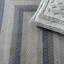Tapis rayé en coton tressé-447639841