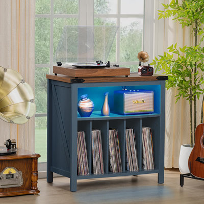 Grand meuble pour platine vinyle avec station de recharge, éclairage DEL et armoire de rangement pour 230 disques.