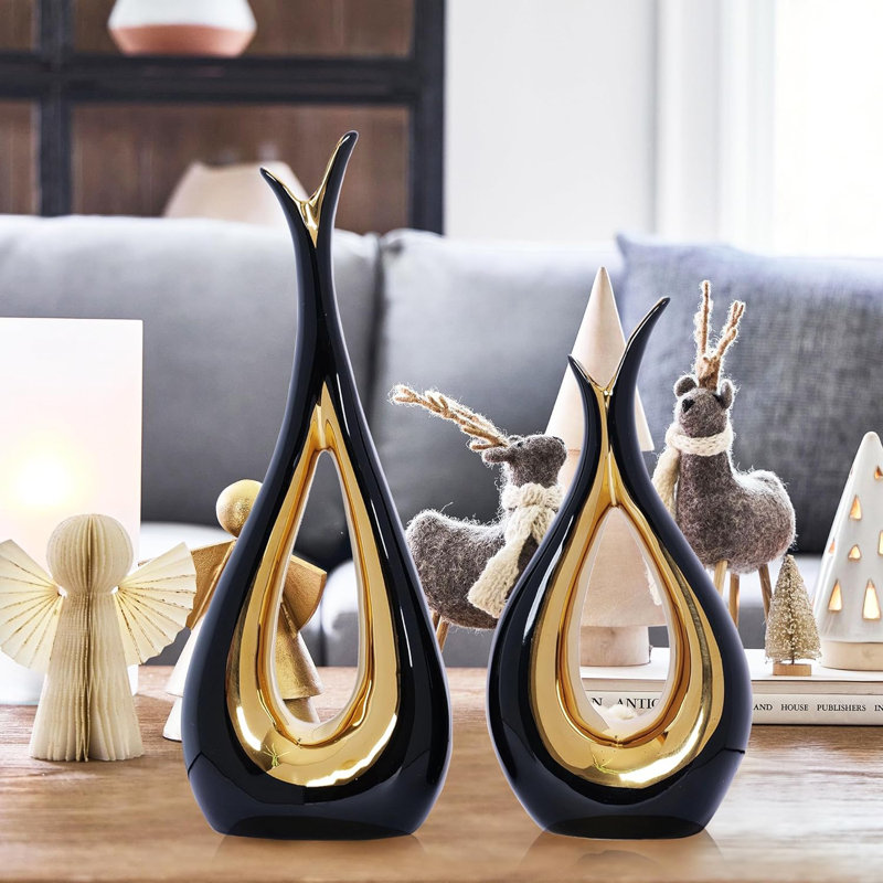 2 vases en céramique or noir