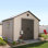 Remise de rangement extérieure en polyéthylène haute densité (plastique) à construction renforcée d'acier 11 pi x 11 pi Lifetime