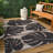 Colgin Classic Beach Stripe and Monstera Leaf Black/Beige Indoor/Outdoor Rug-741757537