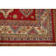 Tapis rouge à motif oriental Kazak