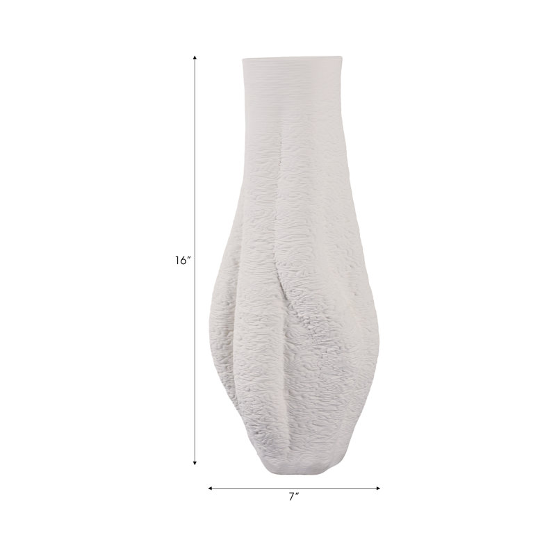 Porcelain Sculptural Vase With Organic Curved Silhouette And Intricate Textural Detailing For Artistic Accent And Contemporary Decorative Display In Modern Interior Settings