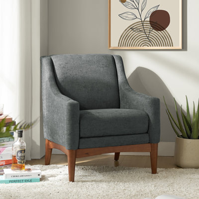 Fauteuil Arshanti avec pieds en bois massif