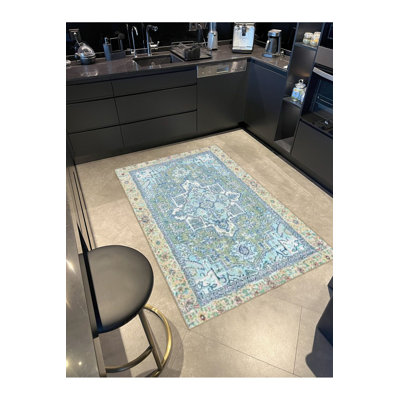 Tapis bleu lavable décoratif à motif floral traditionnel bleu