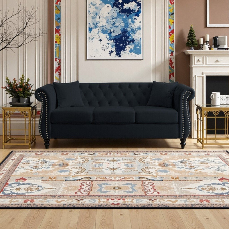 Canapé Chesterfield Chesterfield 3 places avec accoudoirs roulés et garniture cloutée