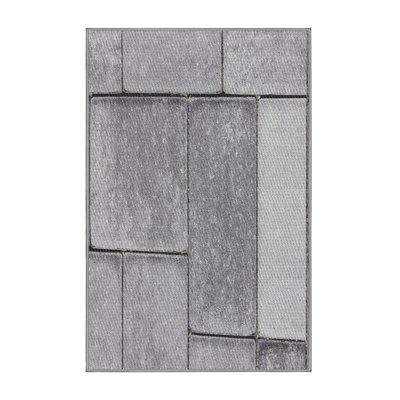 Tapis gris tissé à la machine
