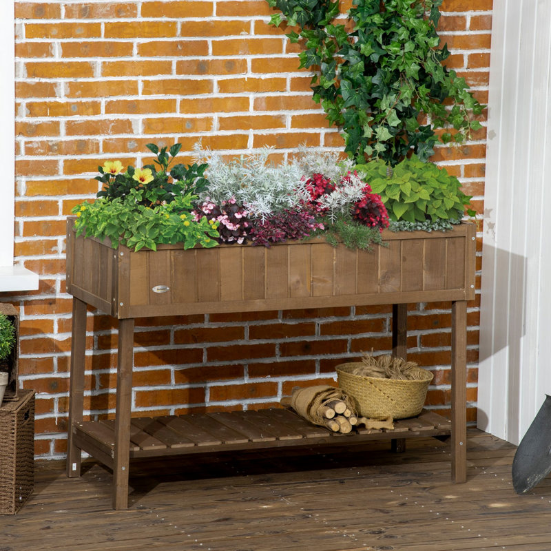 Boîte à fleurs surélevée en bois avec pieds et tablette