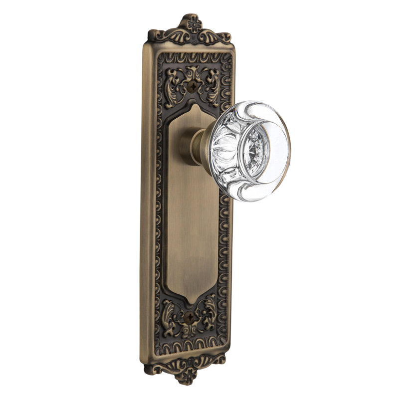 Egg & Dart Plate with Round Clear Crystal Door Knob, Antique Brass