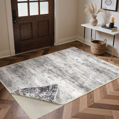Pavelina Abstract Reversible Gray/Dark Machine-Washable Area Rug with Rug Pad