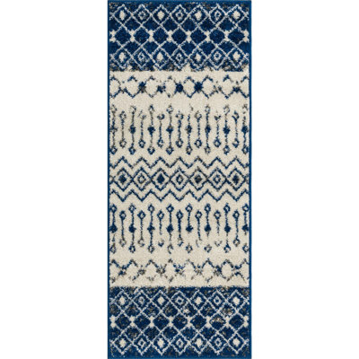 Tapis abstrait en polypropylène tissé à la machine Bradley-Joe en ivoire / bleu marine