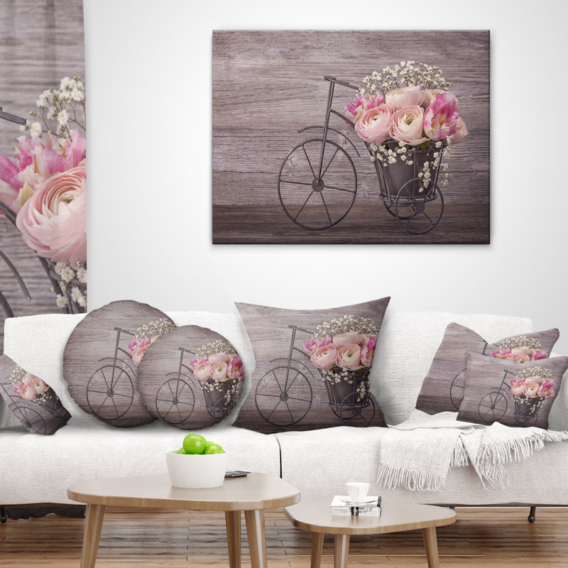 Coussin lombaire à fleurs florales sur bicyclette renoncule