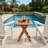 Sturdy Natural Teak Wood Square Coffee Table With Heavy Duty X Shaped Support Legs And Breathable Slatted Tabletop For Balcony Patio Backyard Garden